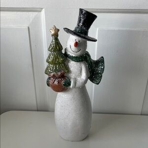 Festive Snowman Figurine with Green Scarf and Black Hat